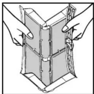 Illustration of two hands holding a folded or folded object with internal components (no text or symbols)