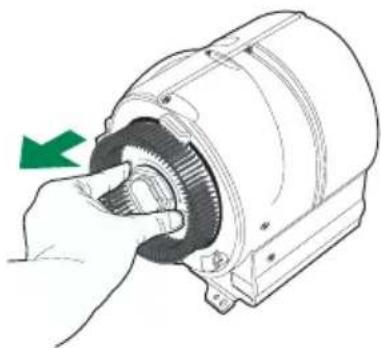 Illustration of a hand turning a mechanical gear (no text or symbols visible)