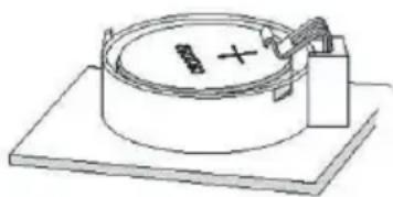 Simple line drawing of a circular device with a plus sign and connected tubing, mounted on a base (no text or symbols)