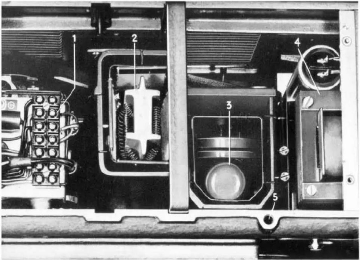 Technical diagram of an electrical device with numbered components for identification