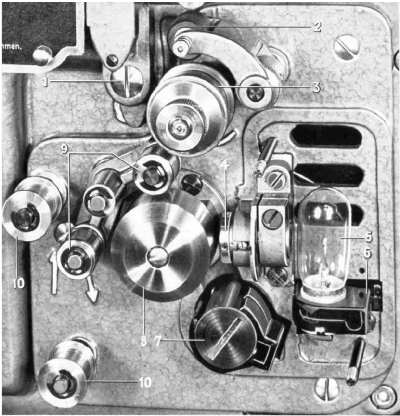 Technical diagram of a mechanical device with numbered components, likely an optical or mechanical assembly.