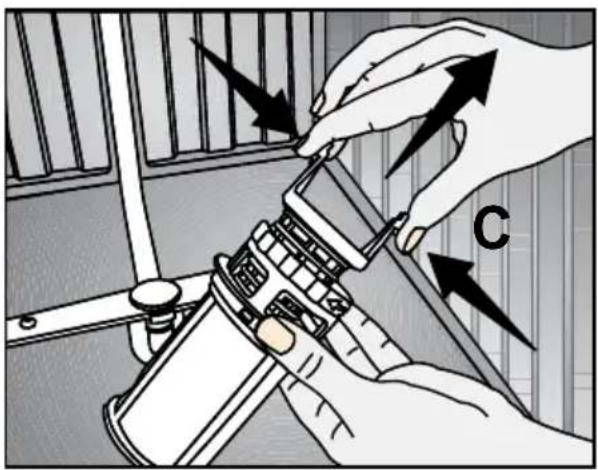 Diagram showing hand operating a mechanical device with labeled component 'C' and directional arrows indicating motion or assembly.