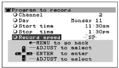 Program to record Channel 2 Day Monday 11 Start time 11:30am Stop time 1:30pm Record speed SP MENU to go back —ADJUST to select ENTER to enter —ADJUST to select