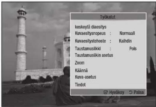 Työkalut keskeytä diaesitys Kuvaesitysnopeus : Normaali Kuvaesitystehoste : Kaihdin Taustamuslikki : Pols Taustamusikin asetus Zoom Käännä Kuva-asetus Tiedot Hyväksy Palaa
