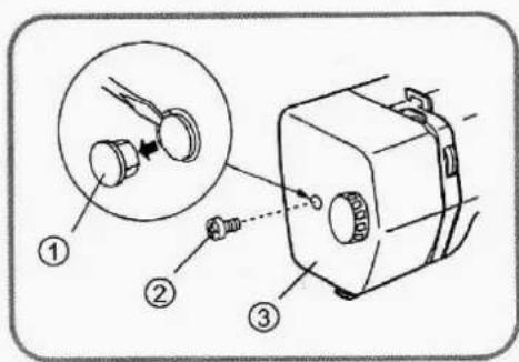 Diagram showing a mechanical device with three labeled parts: one through a magnified inset, and two connected components.