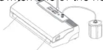 Line drawing of a printer with a cylindrical device connected to its base (no text or symbols)