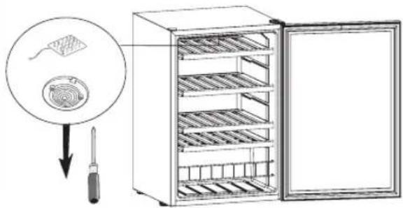 Diagram showing a refrigerator with a side panel and a tool, illustrating the setup for cleaning or inspection.