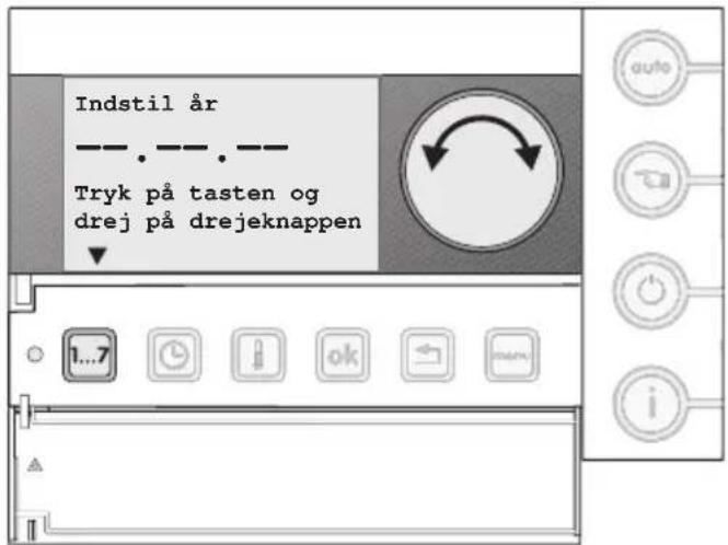 Indstil år ---.---. Tryk på tasten og drej på drejeknappen 1...7 ok i auto
