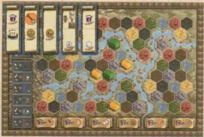 Game board layout with hexagonal tiles, numbered cards, and a central map showing terrain features like houses, buildings, and vehicles.