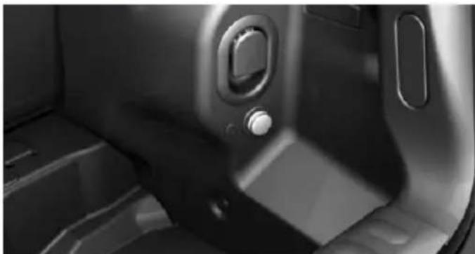 Interior view of a car showing the side panel and seat area (no visible text or symbols)