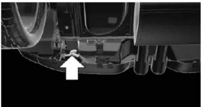 Close-up of a vehicle's lower body and suspension components, showing no visible text or symbols