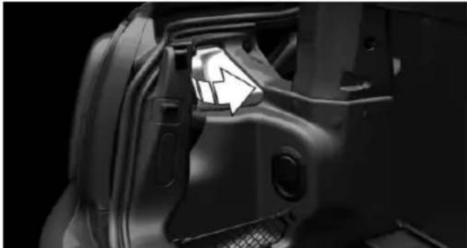 Close-up of a car's front compartment showing the door, seat, and window (no visible text or symbols)