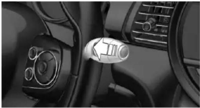 Interior view of a car dashboard with steering wheel and directional arrow (no text or symbols)