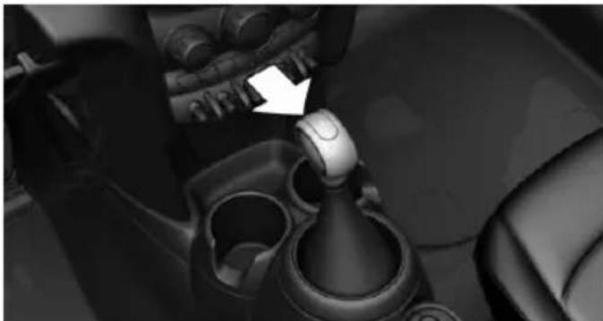 Close-up of a car gear shift lever mechanism (no visible text or symbols)