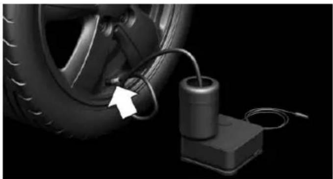 Close-up of a car tire connected to a battery and cable, with an arrow pointing to the tire component (no text or symbols visible)