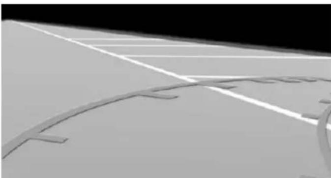 Exterior view of a paved road with lane markings and a curved ramp (no text or symbols visible)