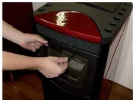 Person using a red and black portable toaster with a digital display (no visible text or symbols)