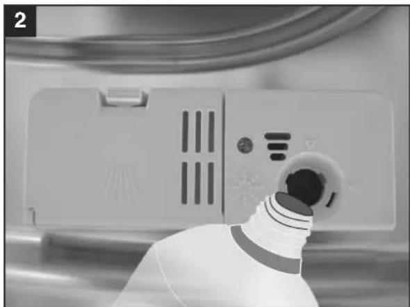 Close-up of a kitchen appliance with a bulb inserted, showing no visible text or symbols.