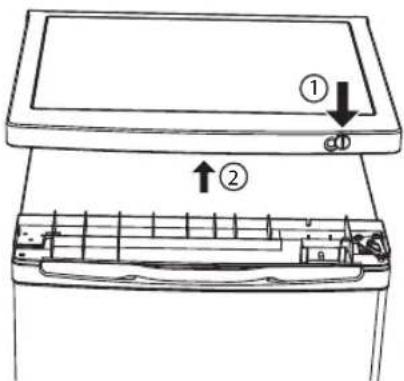 Diagram of a refrigerator interior with labeled parts and directional arrows indicating movement or change.