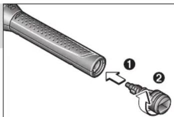 Diagram showing a device with labeled parts, including a handle and connector, with arrows indicating movement or assembly.