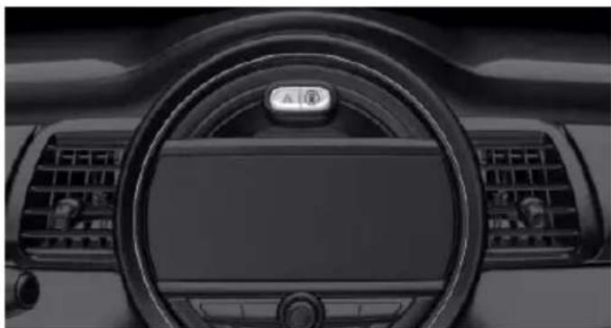 Interior view of a car dashboard with steering wheel and air conditioner (no visible text or symbols)