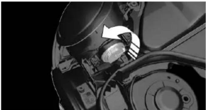 Close-up of a mechanical component with a white arrow indicating a specific part (no visible text or symbols)