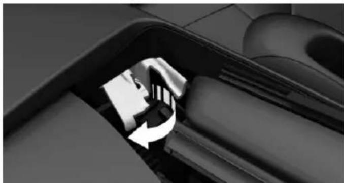 Close-up of a mechanical component with a curved arrow indicating rotation or movement (no text or symbols visible)