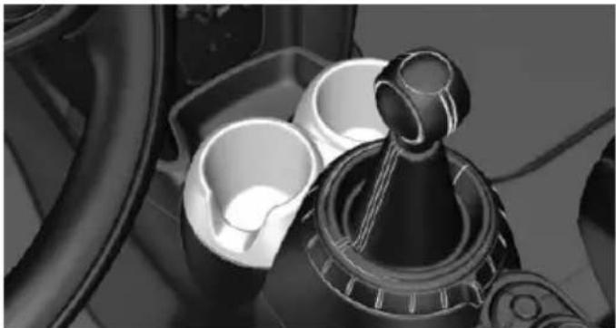 Close-up of a mechanical gear shift lever with open cup and shaft (no text or symbols visible)