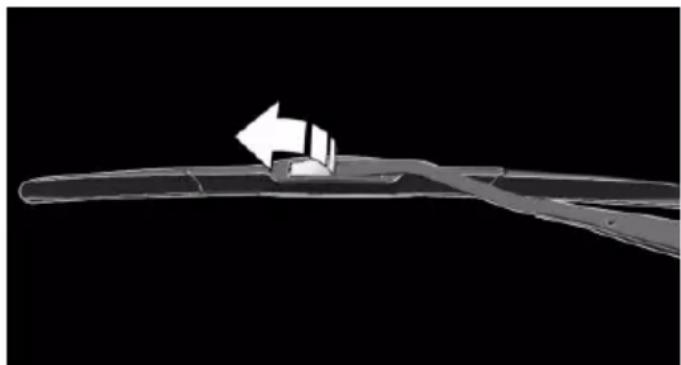 Diagram of a mechanical component with an arrow indicating direction, no visible text or symbols