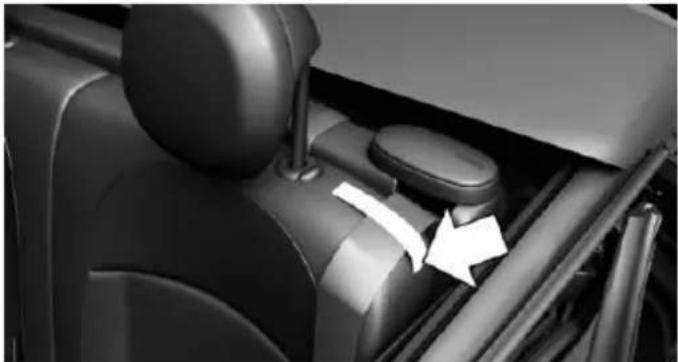 Interior view of a car showing the wheel, seat, and dashboard (no visible text or symbols)