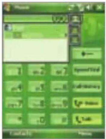 Screenshot of a mobile phone interface with green screen, calculator buttons, and status bar