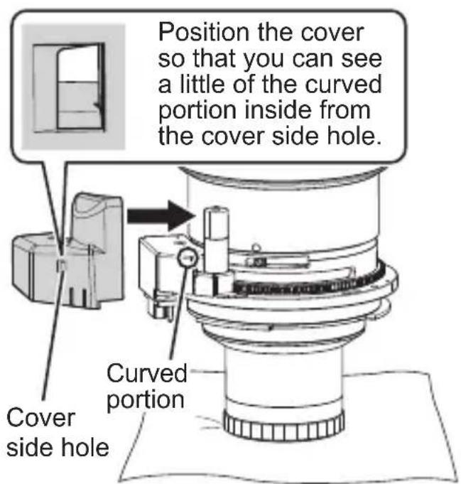 Position the cover so that you can see a little of the curved portion inside from the cover side hole. Cover side hole Curved portion