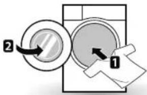 Diagram showing a washing machine with labeled parts, including a circular component and a hand holding a paper.