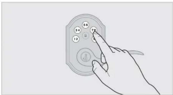 Hand interacting with a remote control panel showing numbered buttons and a play button