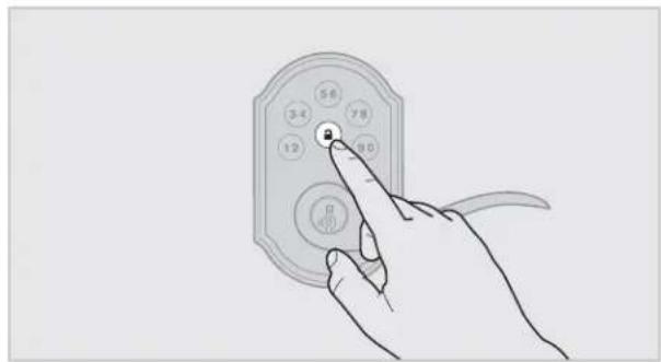 Hand holding a touchscreen device with numbered buttons and a circular icon, likely for digital display or app interface.