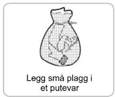 Legg små plagg i et putevar