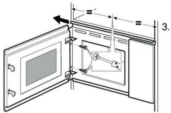 Technical diagram of a microwave oven with labeled dimensions and internal components