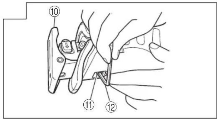Technical diagram showing hands operating a tool with numbered parts labeled 10, 11, and 12
