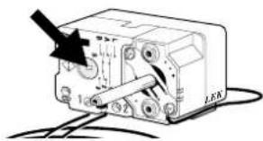 Diagram of an electronic device with labeled components and a black arrow indicating a specific connection point.