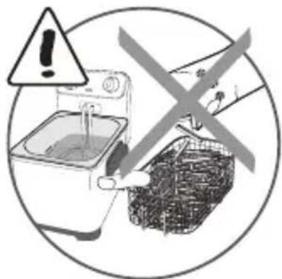 Warning symbol showing a washing machine and a basket with a crossed-out sign, indicating hazardous or unexposed items.