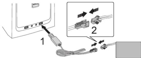 Diagram showing cable connections to a device with labeled components and directional arrows indicating wiring or signal flow.
