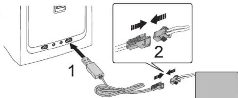 Diagram showing cable connection with labeled components and directional arrows indicating wiring or connections between devices