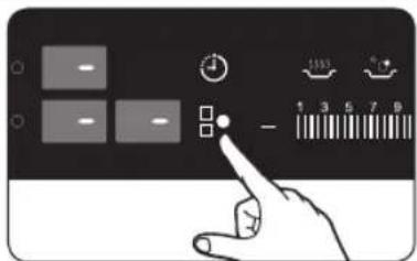 Hand interacting with a touchscreen display showing control buttons and numeric keypad