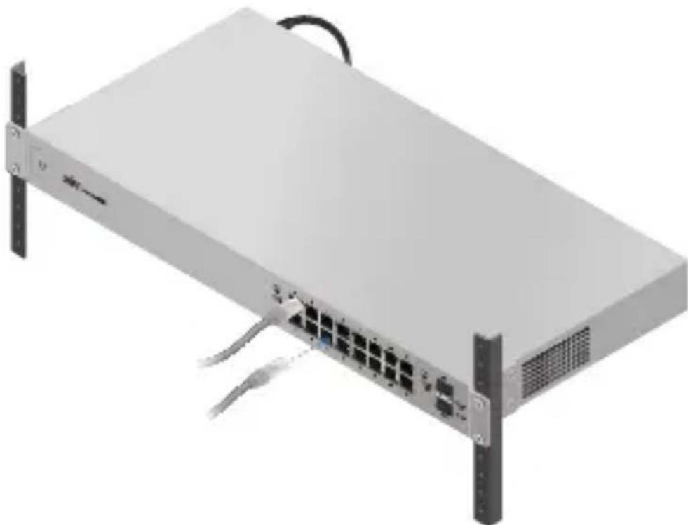 Exterior view of a network switch device with multiple Ethernet ports and cables (no text or symbols visible)