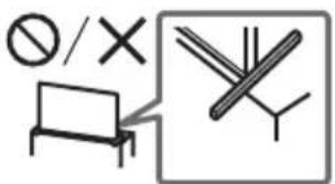 Safety warning symbols including no sign, X, and crossed-out wires with a table and tree symbol
