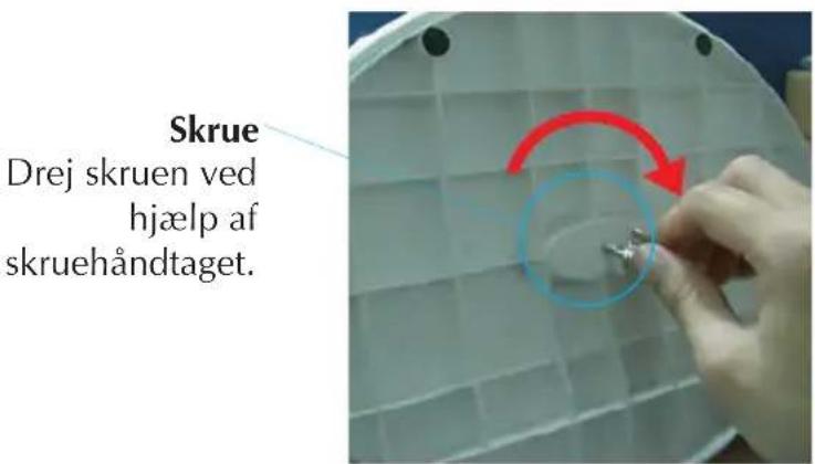 Skrue Drej skruen ved hjælp af skruehåndtaget.