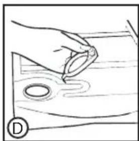 Simple line drawing of a hand holding a ring over a wooden surface with two circular holes (no text or symbols).