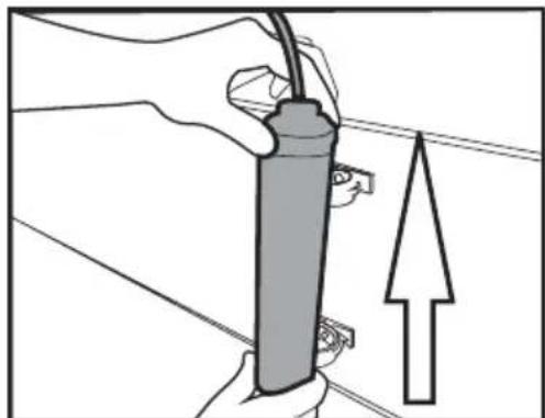 Illustration of a hand holding a cylindrical device with wires, next to an upward arrow (no text or symbols).