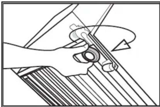 Mechanical diagram showing hands operating a tool with a curved handle (no text or symbols).