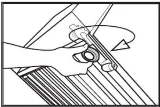 Mechanical assembly diagram showing a hand operating a tool with a curved handle (no text or symbols)